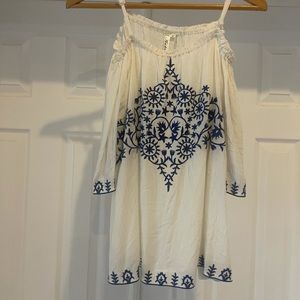White crepe off the shoulder blouse with blue embroidered detail
